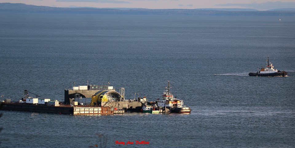 Scotia Tide barge HFX (carrying the OpenHydro turbine), and Atlantic Hemlock tug in Pleasant Cove, off Cape Sharp. Photo taken by Betty Ann DeWitt on Saturday