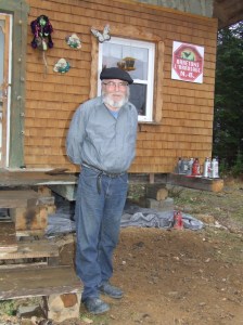 Thériault outside his straw bale house